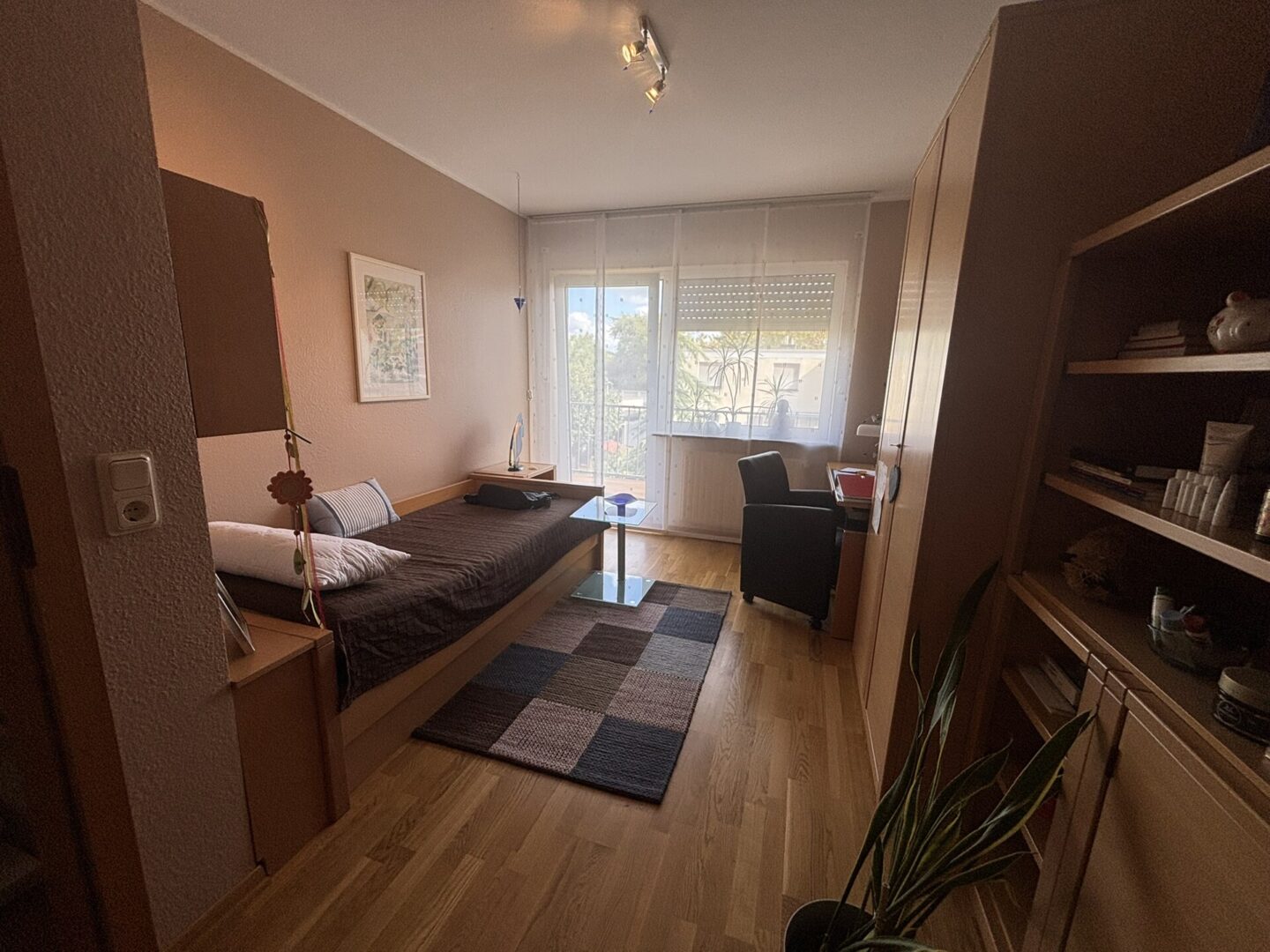 Schlafzimmer mit Balkonzugang